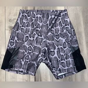 Onzie Flow snake print and mesh workout shorts